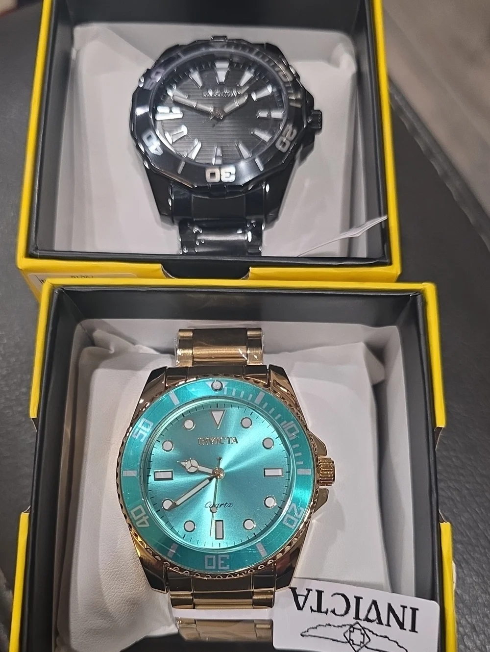 721. Pair Of Men's Invicta Watches
